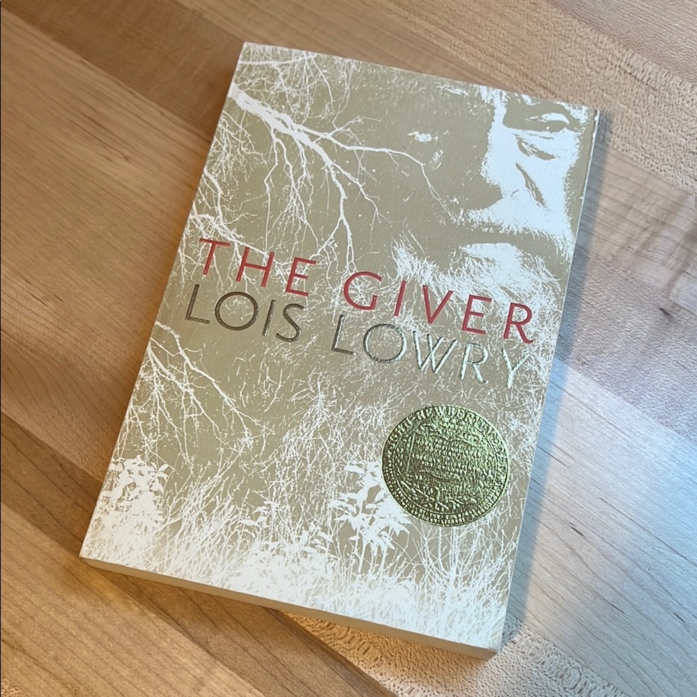 The Giver by Lois Lowry -- young adult literature, dystopian, science fiction